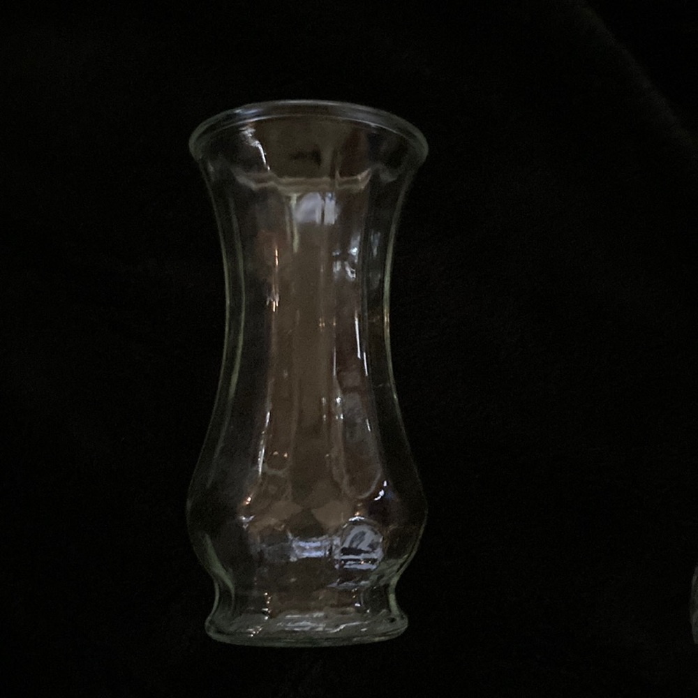 Vase of heavy pressed glass with sunburst bottom creating button look effect